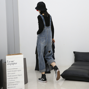 宽松破洞背带裤女