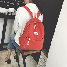 帆布双肩包女小清新简约纯色背包高中学生书包大书包潮女包 日韩版