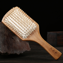 牛老爹旗舰店-气垫梳子木头黑檀木梳子家用卷