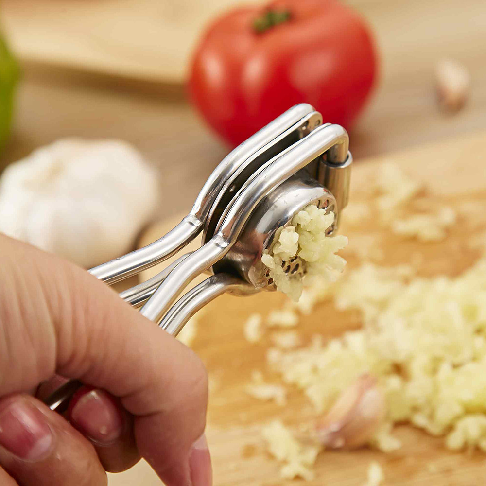 包邮 德国进口304不锈钢手动压蒜器蒜泥器家用挤蒜器捣蒜器剥蒜器
